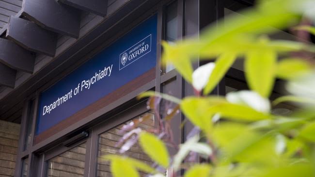 Image shows the front double doors of the Department of Psychiatry building.