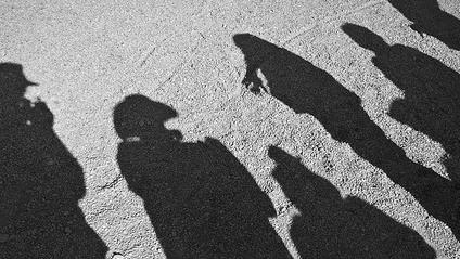 Picture of people in shadow.